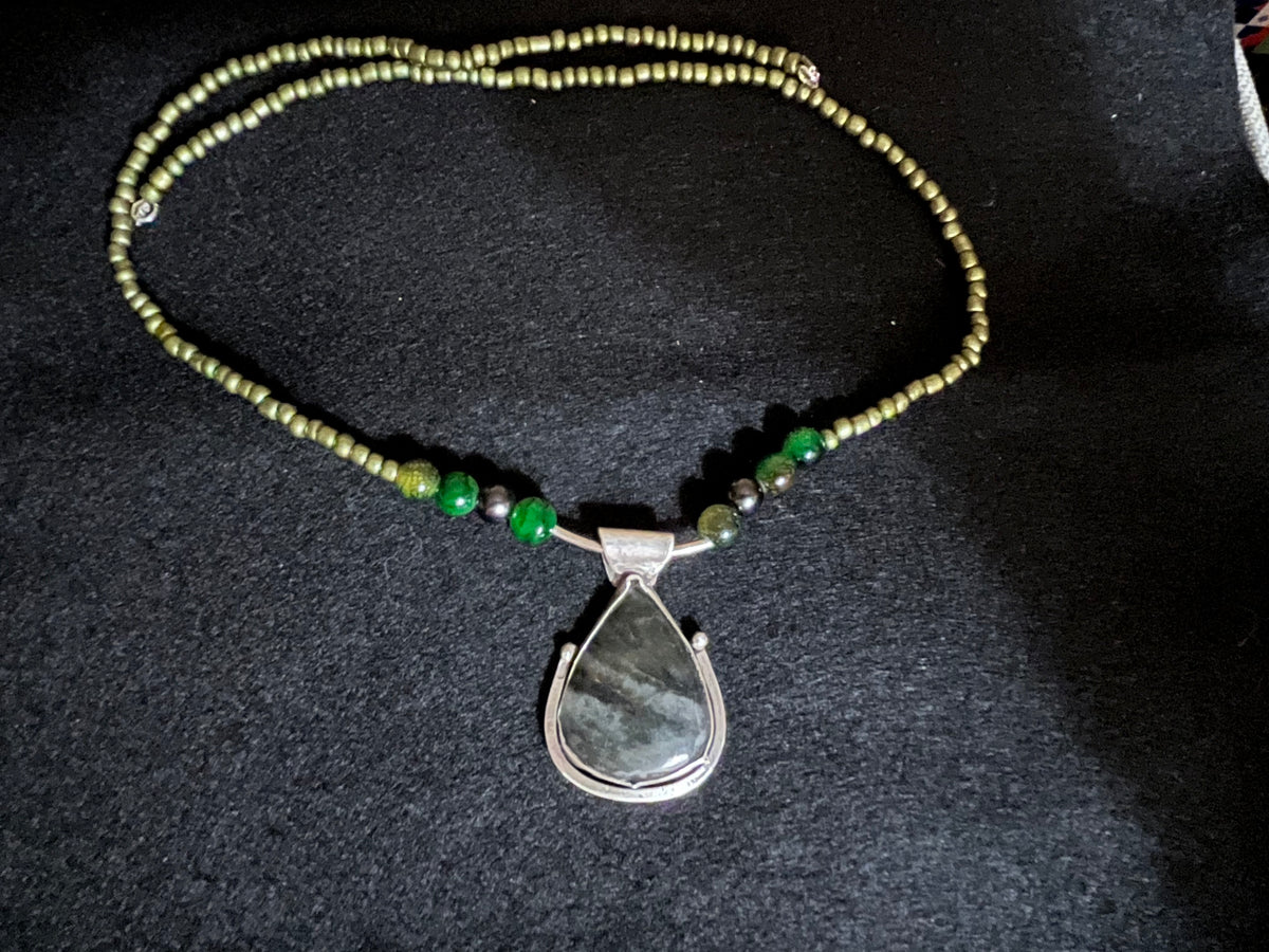 Teardrop Moss Agate in Sterling Silver on a beaded necklace