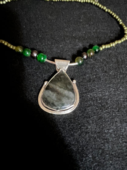 Teardrop Moss Agate in Sterling Silver on a beaded necklace