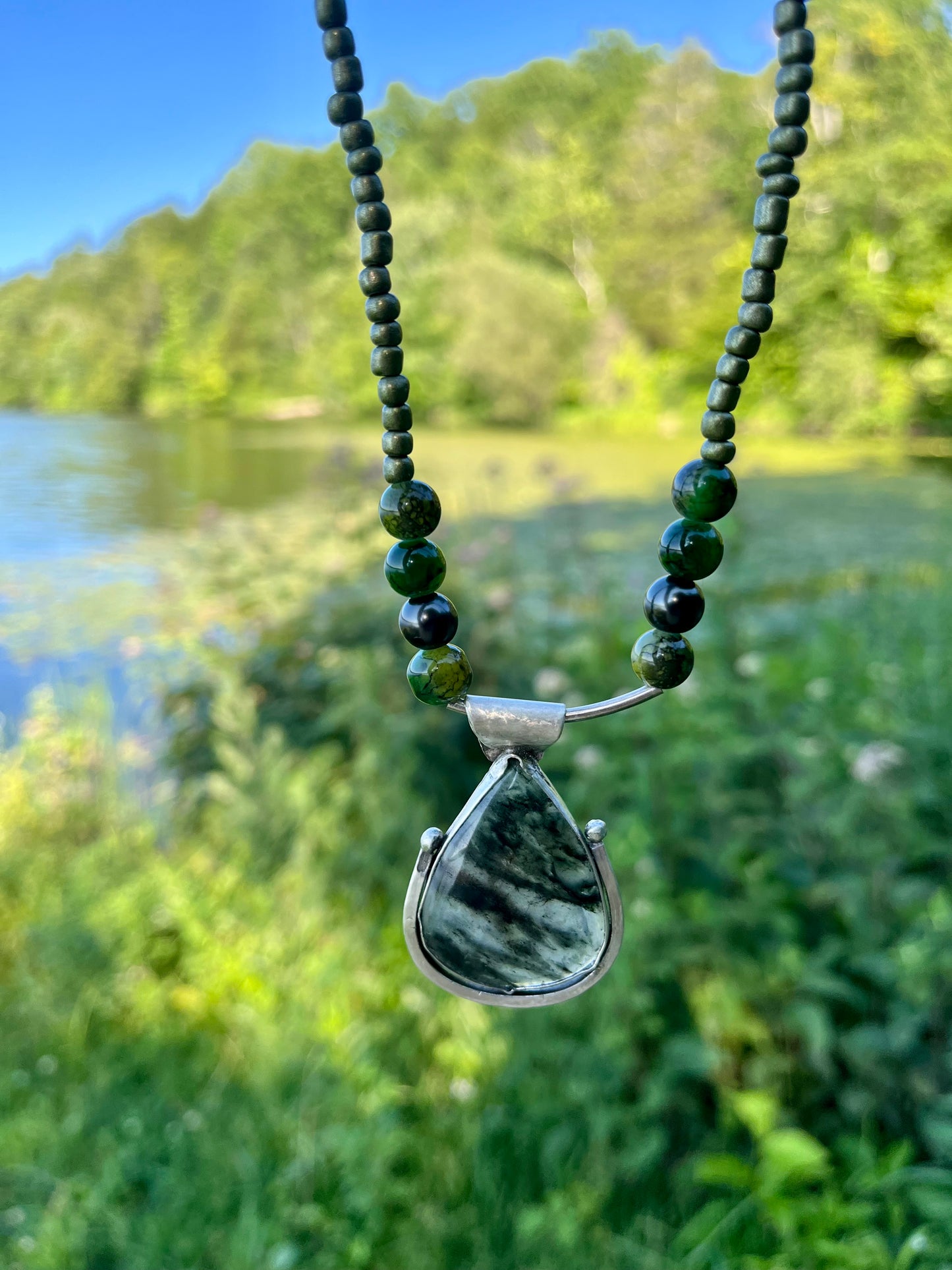 Teardrop Moss Agate in Sterling Silver on a beaded necklace